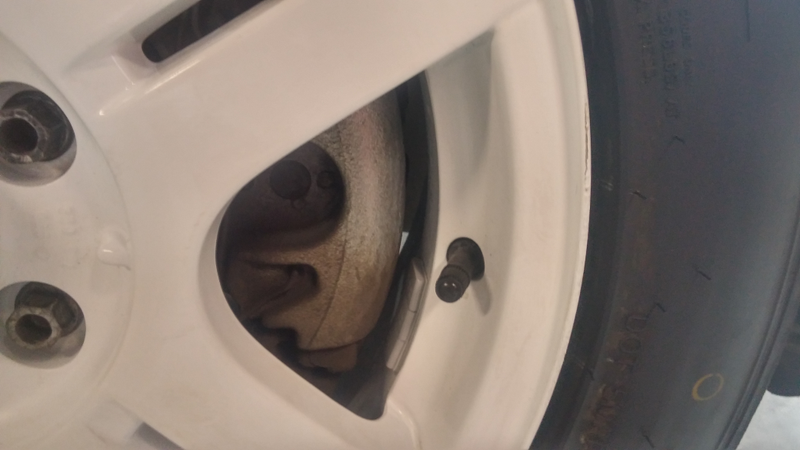 Thats my kind of fitment! 1/4 inch between barrel and caliper!